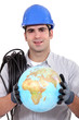 Electrician holding a globe.