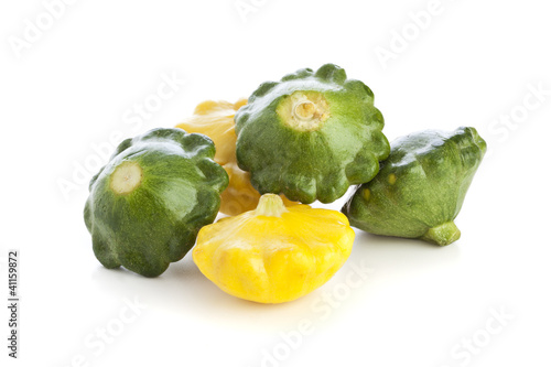 Photo: Green and Yellow Pattypan Squashes Isolated Green and Yellow Pattypan Squashes Isolated