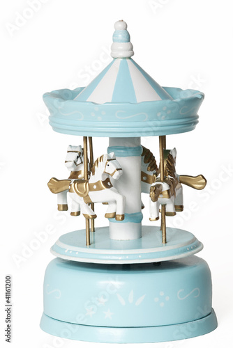 Photo: Blue merry-go-round toy on white Blue merry-go-round toy on white