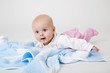 little girl on a blue towel
