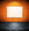 Aged paper on the brick wall