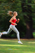 Woman running in a park