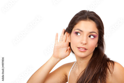 Photo: woman with cupped hand listening woman with cupped hand listening