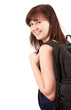 cheerful student girl with black backpack, white background
