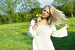 Photo: Beautiful sexy young woman outdoors, with flower Beautiful sexy young woman outdoors, with flower