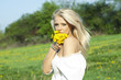 Photo: Beautiful sexy young woman outdoors, with flower Beautiful sexy young woman outdoors, with flower