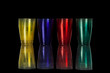 Photo: Colored plastic glasses on black Colored plastic glasses on black