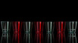 Photo: Colored plastic glasses on black Colored plastic glasses on black