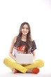 Photo en ligne au meilleur prix Full length of beautiful young girl holding laptop