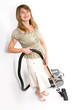 Woman with vacuum cleaner isolated on white