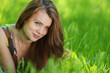 beautiful woman laying on grass