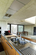 house in cement, interior, wooden kitchen island