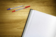 work book and pens