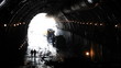 People in a tunnel. Building site. People in a tunnel. Building site.