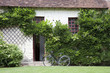 bike near the entrance in a traditional house, France
