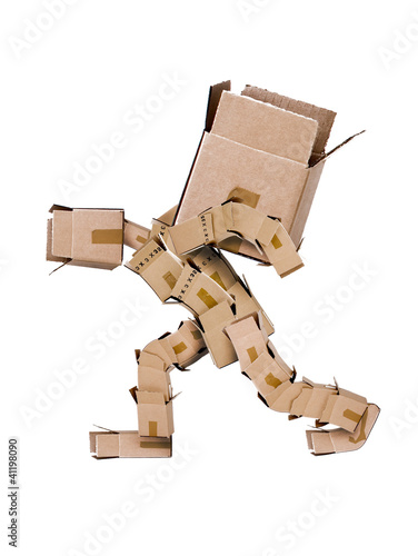 Photo: Box character hauling large box Box character hauling large box