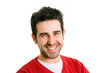 Young man in red shirt laughing, isolated on white background Young man in red shirt laughing, isolated on white background