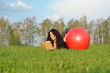 beautiful young woman reading a book