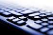 Photo: a close up of a blue computer keyboard a close up of a blue computer keyboard