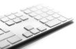 Photo: a close up of a white computer keyboard a close up of a white computer keyboard