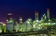Gas storage spheres tank in petrochemical plant at night