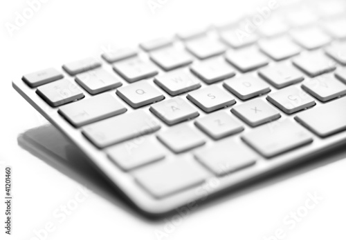 Photo: a close up of a white computer keyboard a close up of a white computer keyboard