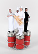 workers of food standing on giant salt cellar and pepperpot