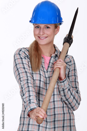 Photo: Woman with a pickaxe Woman with a pickaxe