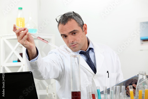 Photo: biologist with test tubes biologist with test tubes