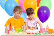 adorable children celebrating birthday party