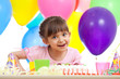 joyful beautiful girl celebrating birthday party