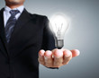 Light bulb in a hand