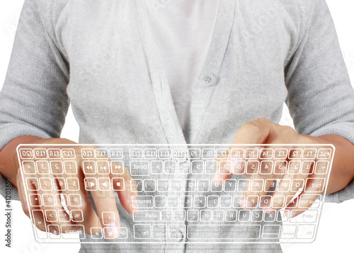 Photo: Typing in on a virtual keyboard Typing in on a virtual keyboard