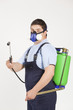 Man spraying insects- pest control