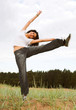 beautiful girl jumping in the park
