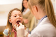 Pediatrician Examine Girl Thro...