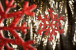 Red snow flake on a gold glitter background Red snow flake on a gold glitter background