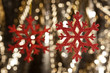 Red snow flake on a gold glitter background Red snow flake on a gold glitter background