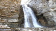 waterfall between two rocks waterfall between two rocks