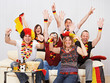 Foto: german soccer fans on the sofa german soccer fans on the sofa