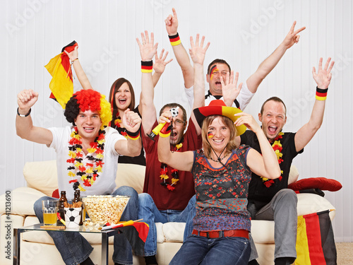 Photo: german soccer fans on the sofa german soccer fans on the sofa