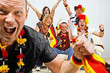 Foto: german soccer fans on the sofa german soccer fans on the sofa