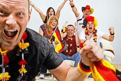 Photo: german soccer fans on the sofa german soccer fans on the sofa