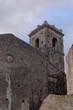 Old church belfry in Savoca village, Sicily, in the evening