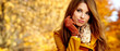 Beautiful elegant womanin autumn park