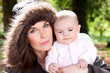 mother holding baby in beautiful natural light mother holding baby in beautiful natural light