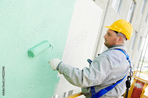 Photo: builder facade painter at work builder facade painter at work