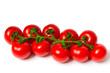 red tomatoes in a dark plastic box, it is isolated on the white