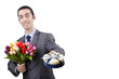 Businessman with giftbox and flowers