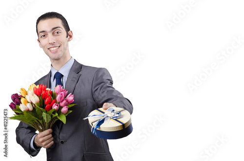 Photo: Businessman with giftbox and flowers Businessman with giftbox and flowers